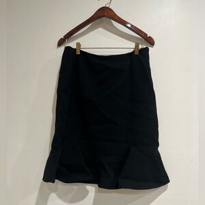 PRADA Form fitting black skirt with flare at the bottom